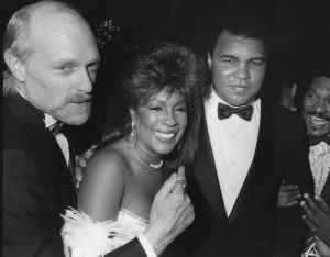 Muhammad Ali with Mike Love and Mary Wilson 1988, NYC.jpg